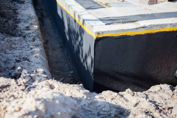 Professional Waterproofing technician working in McMinnville, OR